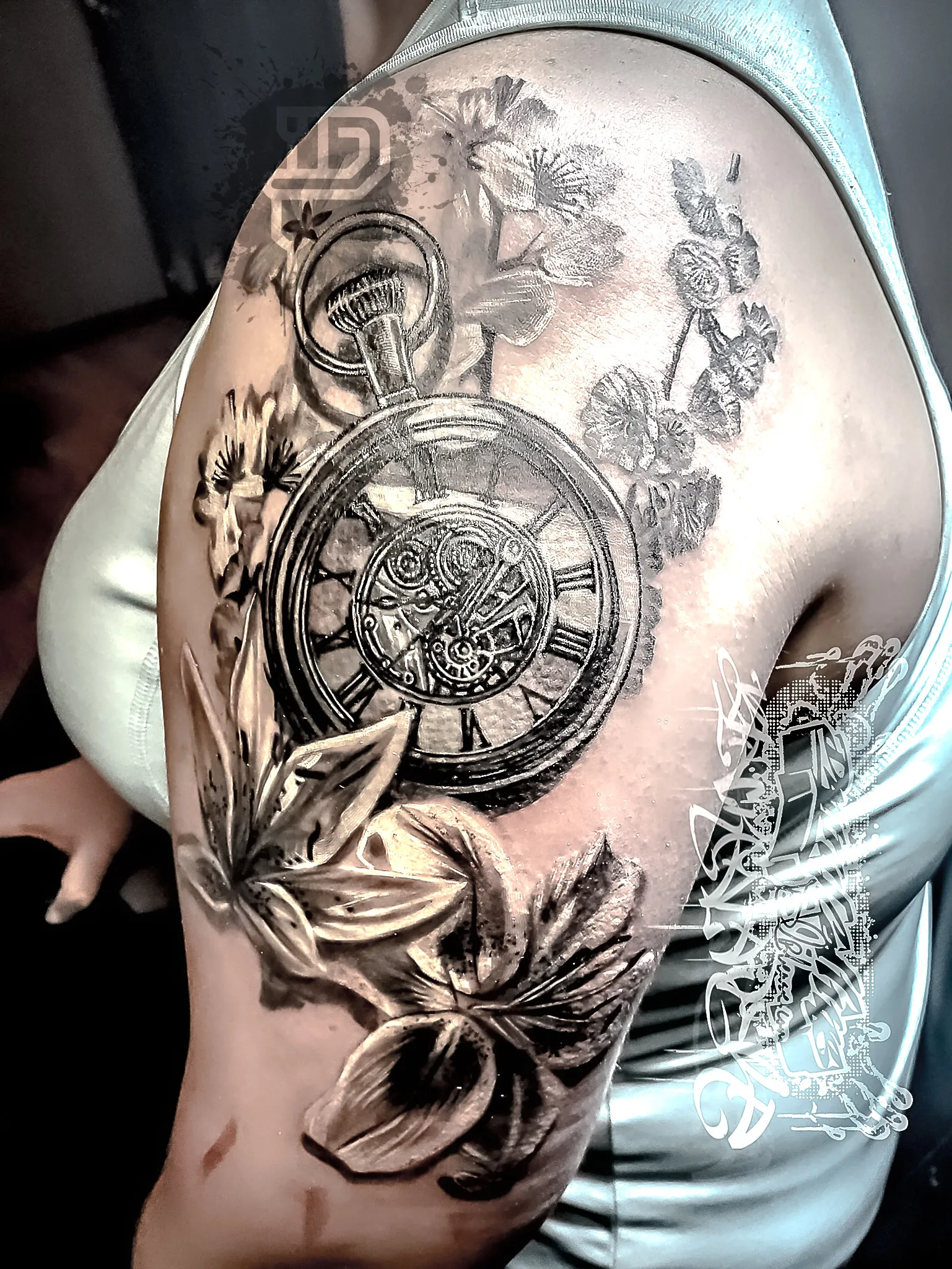 060-Black and Gray Antique Stopwatch with Lilies and Cherry Blossoms Tattoo – Daniel Collins – Premium Tattoo Artistry