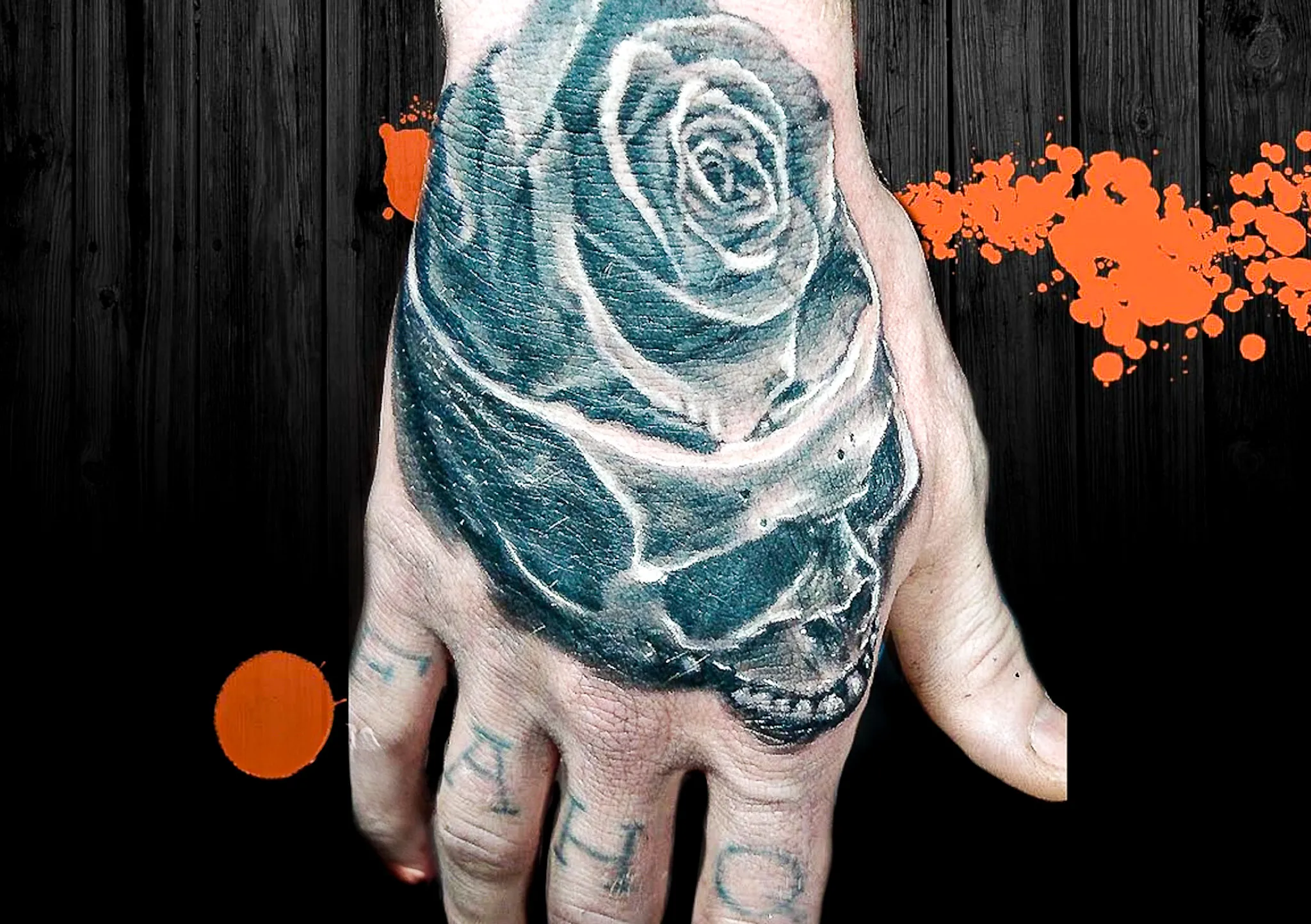 092-Black and Gray Skull and Rose Hand Tattoo – Daniel Collins – Premium Tattoo Artistry