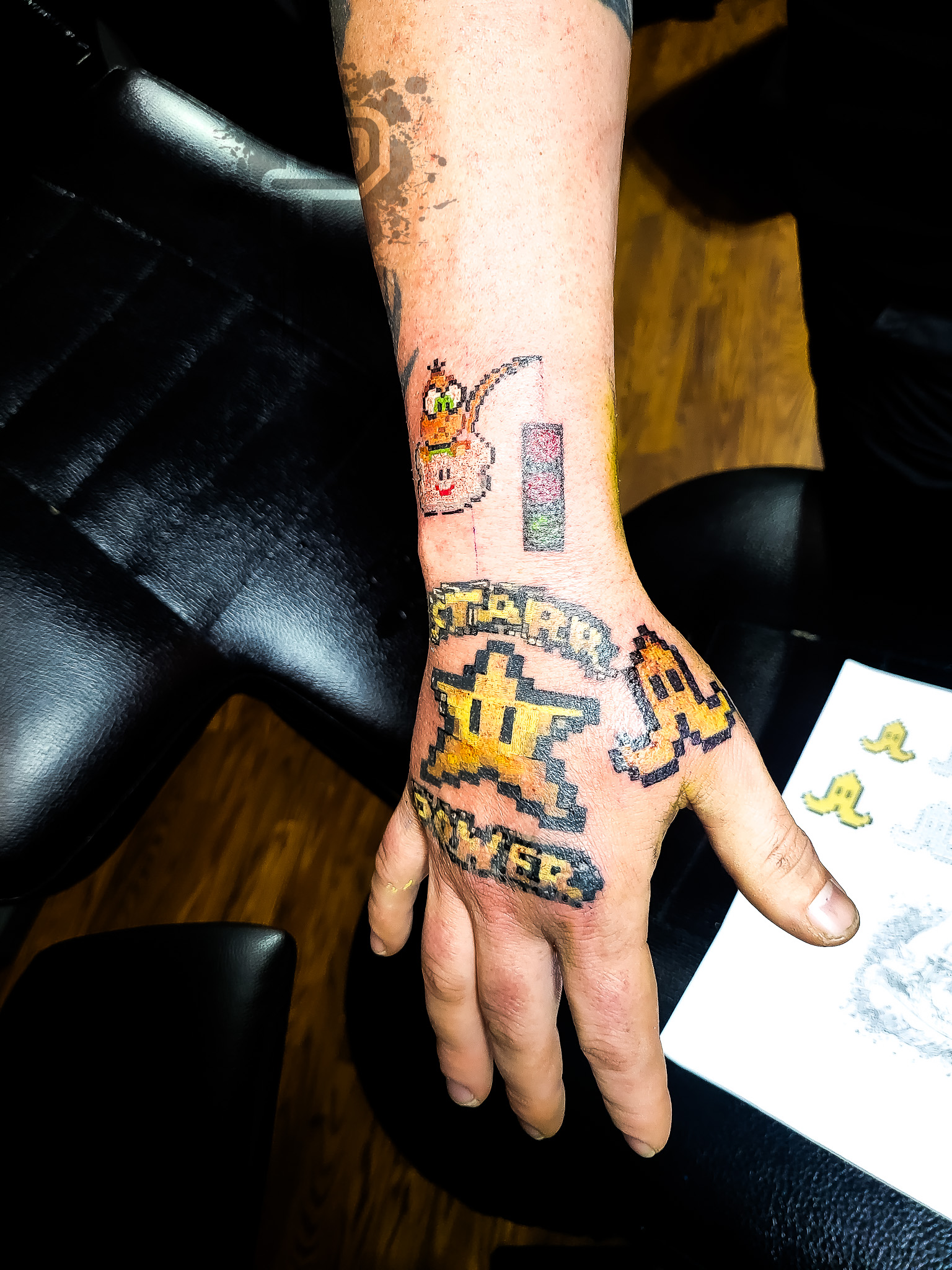 104_mario_kart_star_power_banana_right_hand_daniel_aaron_collins_premium_tattoo_artistry