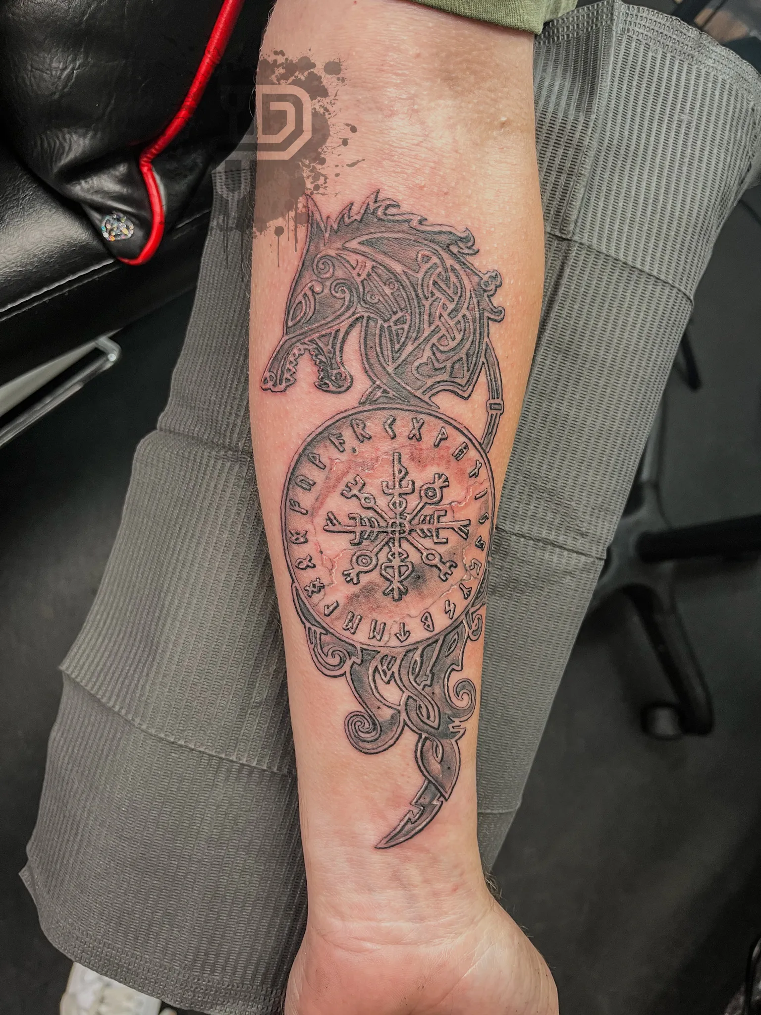 122-Nordic Rune Wolf Stone Texture Forearm Tattoo – Daniel Collins – Premium Tattoo Artistry
