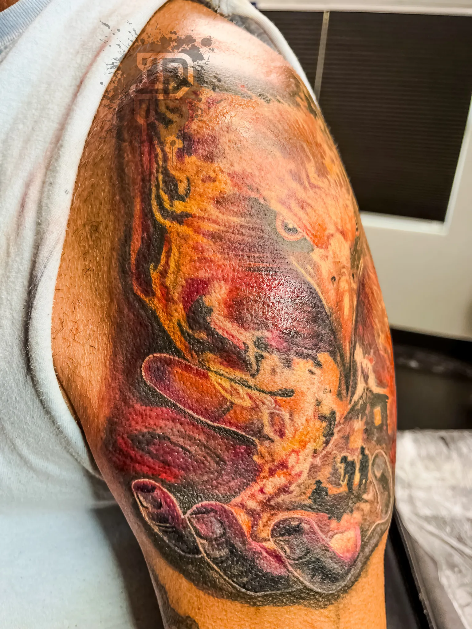 172-Surreal Eagle with Fire, Burning Building, and Firefighters Upper Arm Tattoo – Daniel Collins – Premium Tattoo Artistry