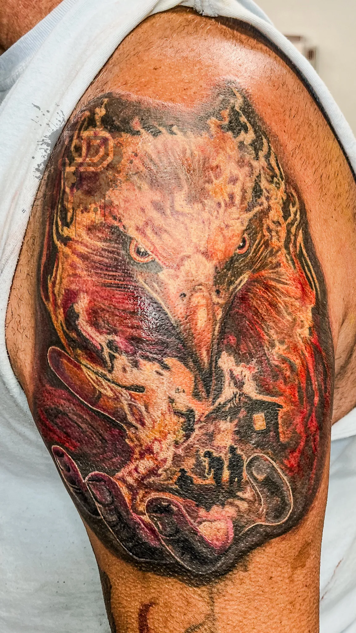 174-Surreal Eagle with Flames and Burning Building Upper Arm Tattoo – Daniel Collins – Premium Tattoo Artistry