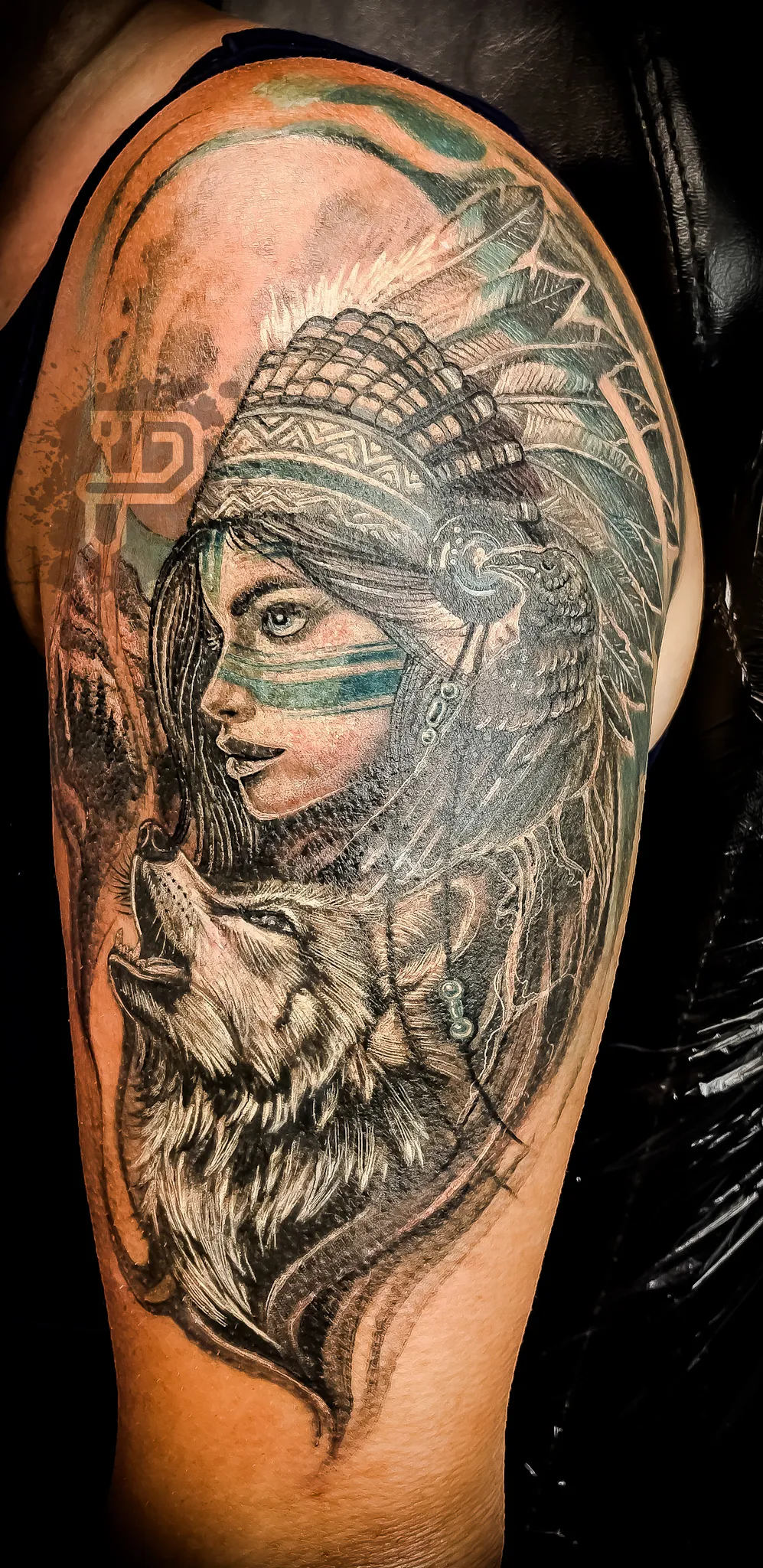 176-Native American Woman with Headdress and Howling Wolf Black and Gray Tattoo – Daniel Collins – Premium Tattoo Artistry