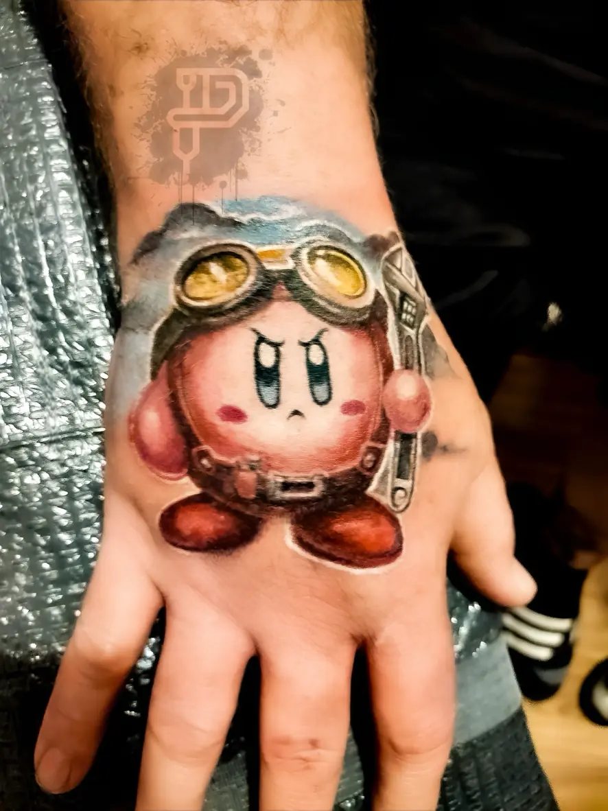 kirby-auto-mechanic-tattoo-color-realism-hand-premium-tattoo-artistry-daniel-aaron-collins-austin-tx