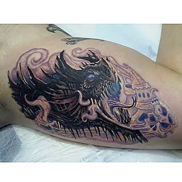 Another perspective: Dragon tattoo with jagged anatomy and swirling gothic energy.